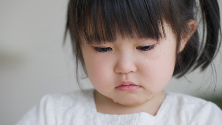 上手くむし歯の痛みを伝えられない女の子